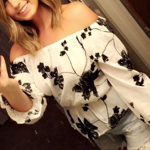 Black and white embroidered off the shoulder top